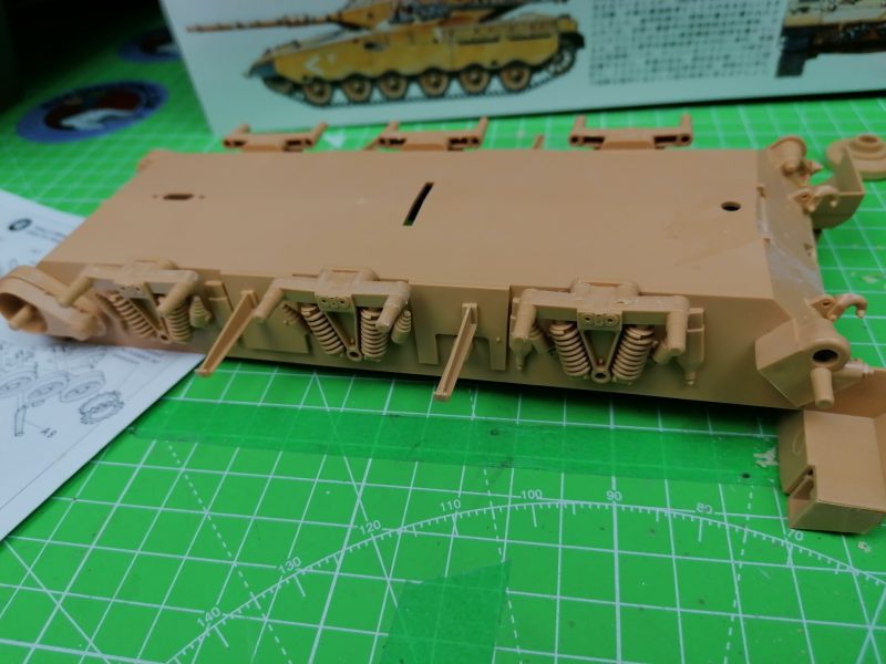 Boogies Cleaned And Fitted To The Lower Hull Of The Model Tank