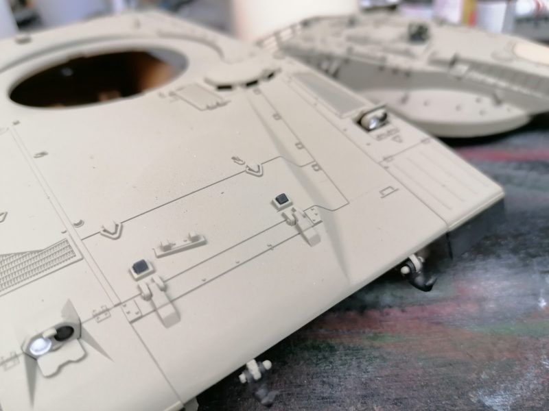 Painting In Some Of The Detailed Parts Of The Model Tank