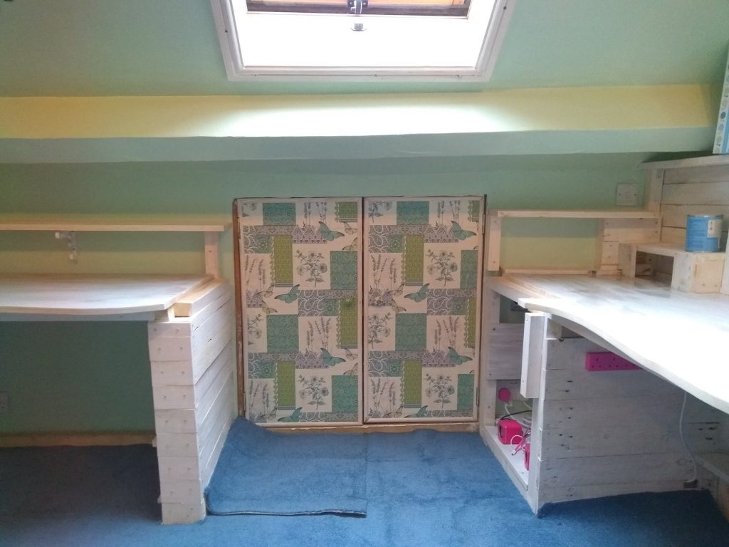 Doors To Loft Storage Covered With Wallpaper