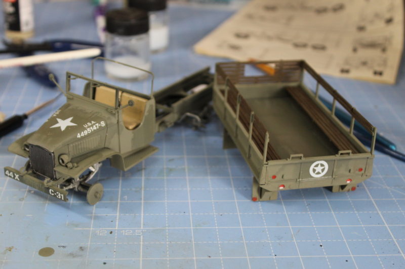 Painting the details on to the cargo truck before washes