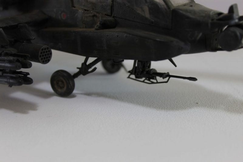 The Front Machine Gun And Wheels On The Apache Helicopter Scale Model.