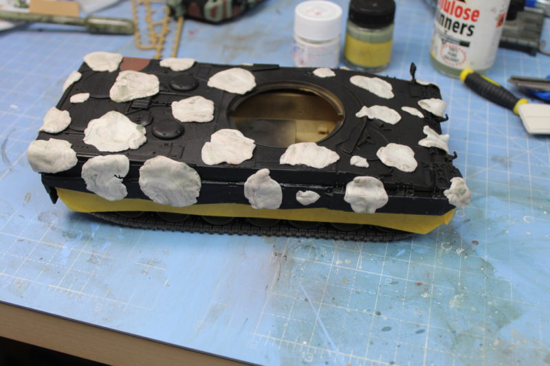 The Scale Model Tank Hull Is Masked For Painting