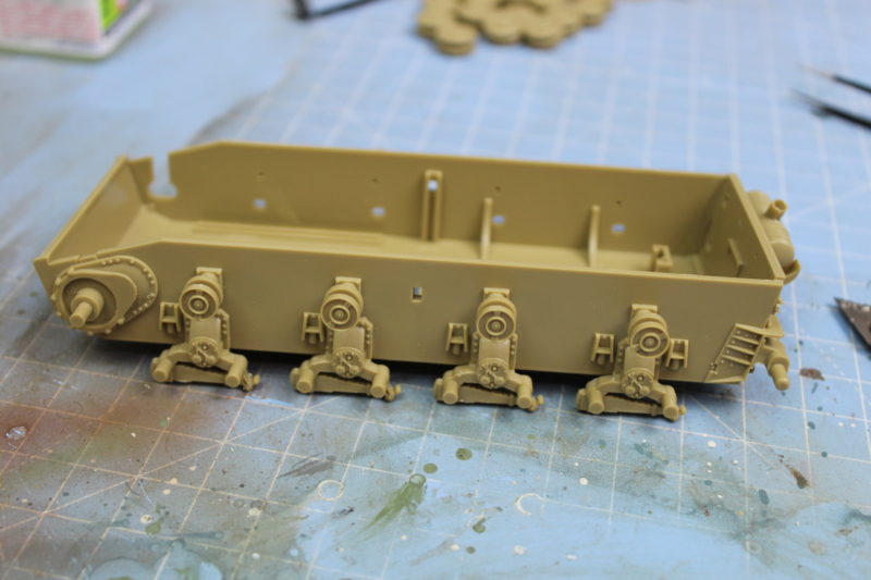 The Suspension Has Been Fitted To The Lower Hull On The Tamiya Scale Model