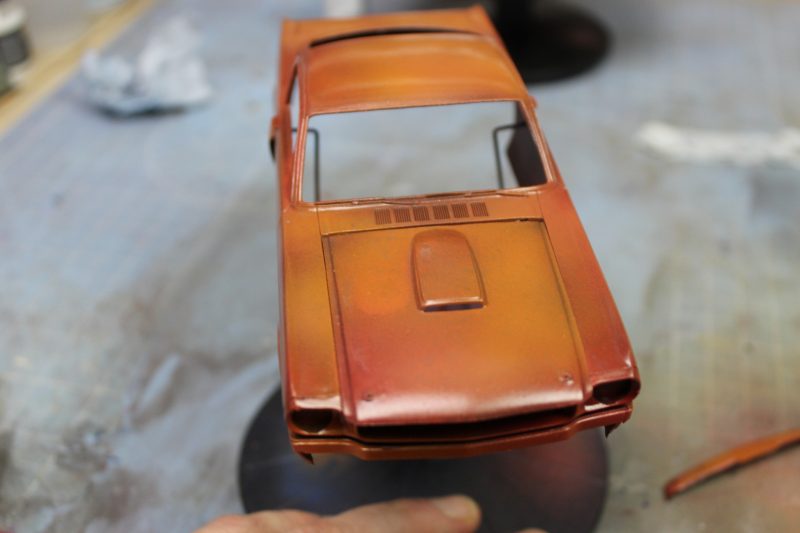 The Mustang Painted With Rust Colours And Varnished